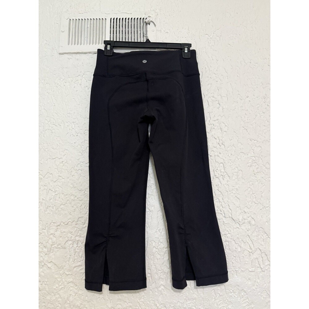 Lululemon Stretch Woven Capri Leggings Pants Black Mid Rise Wide Leg Slits SZ 6